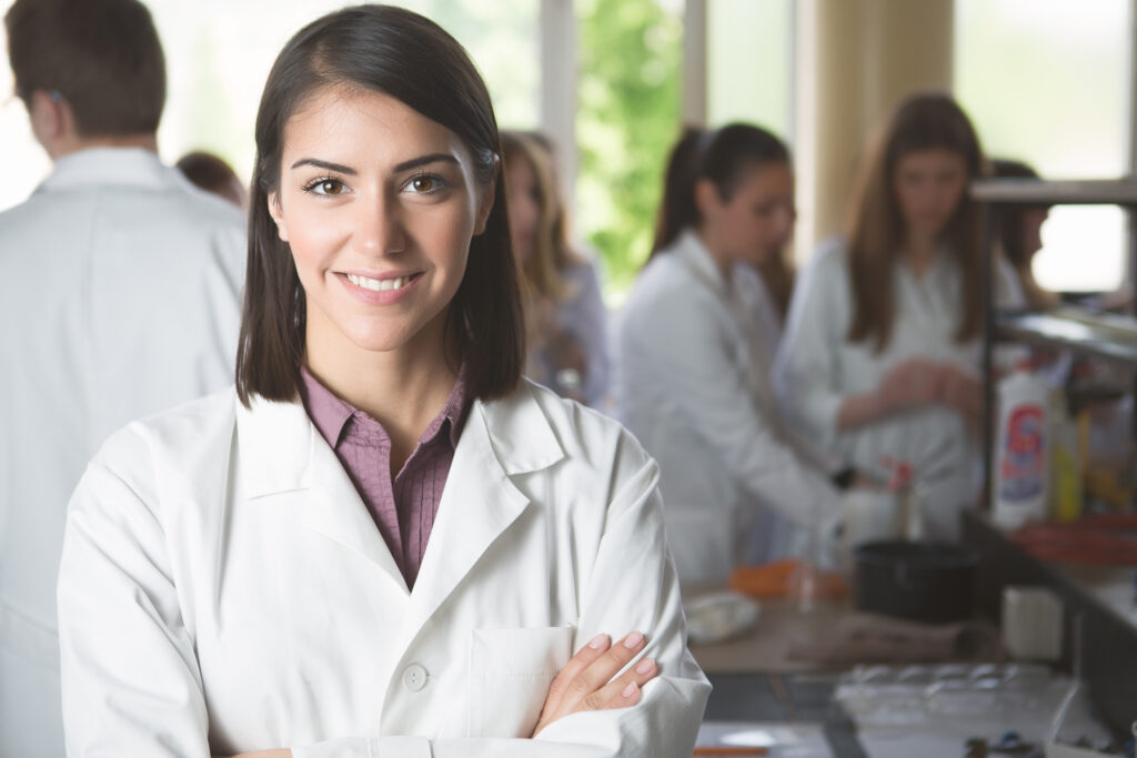 Scientific researcher.Science students working with chemicals in
